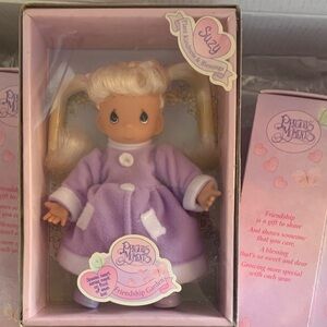 Precious Moments Lavender-Coated Suzy Doll with Blonde Hair